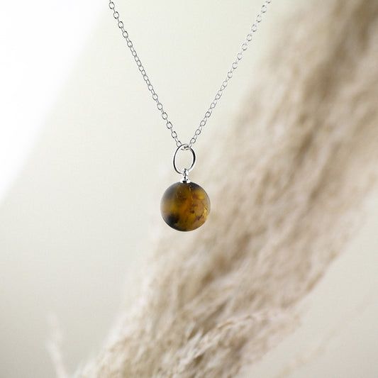 Little raw amber bead pendant