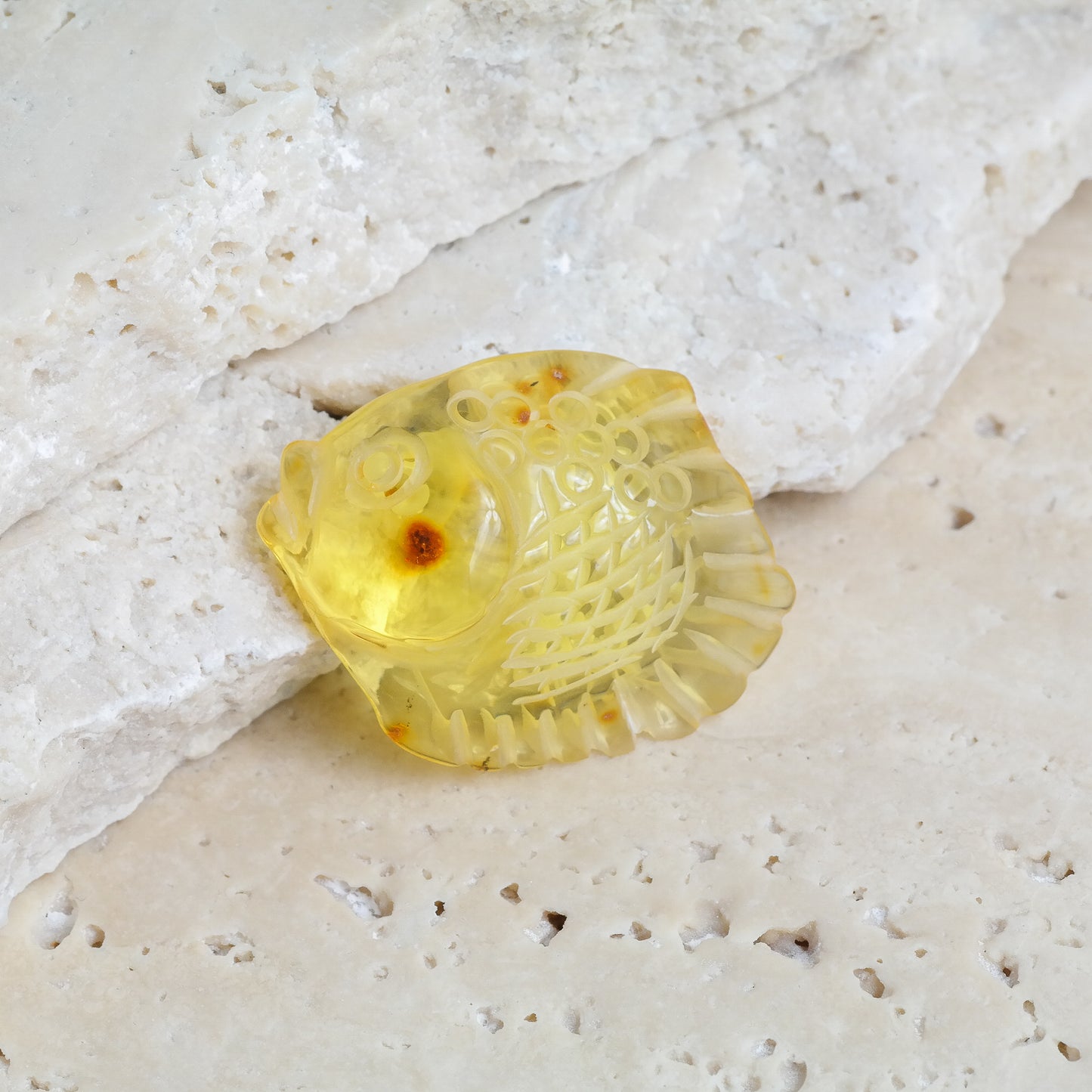 Hand carved fish figurine from natural Baltic amber