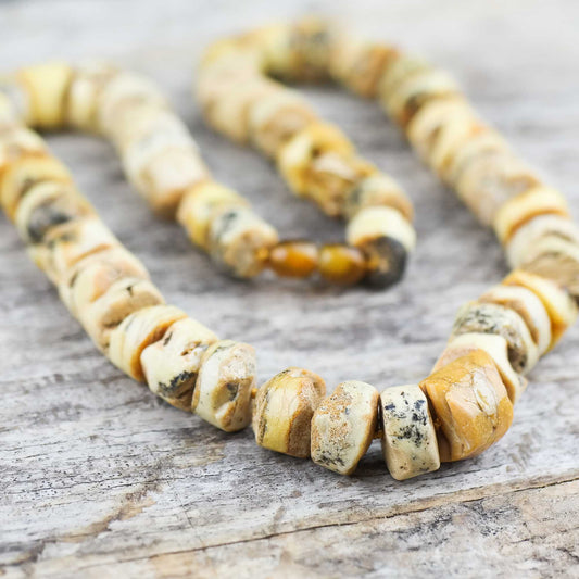 Sea sediment, tube shaped amber bead necklace