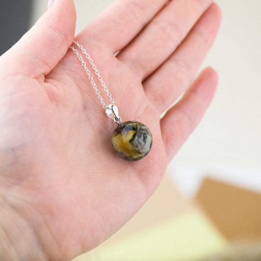 Minimalist natural Baltic amber pendant