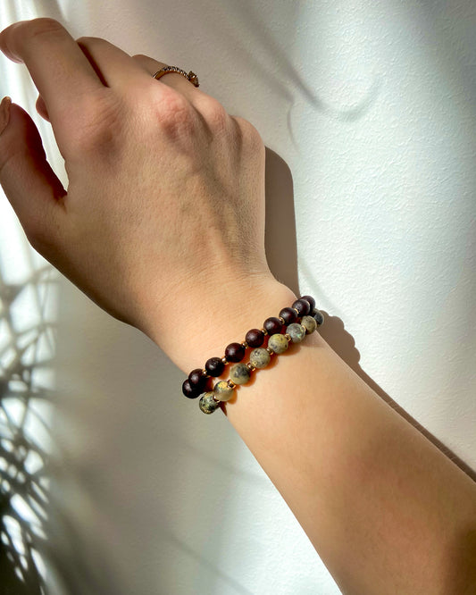 Handmade amber bracelet with gold colour hematite details