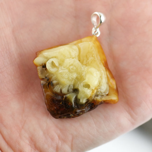 Unique amber lion pendant