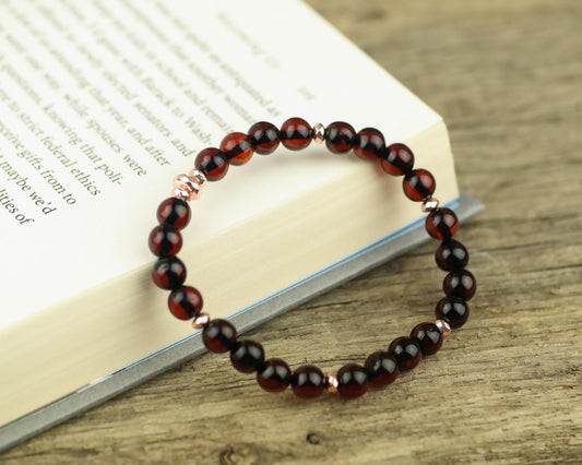 Stylish natural Baltic amber bracelet with rose gold colour details