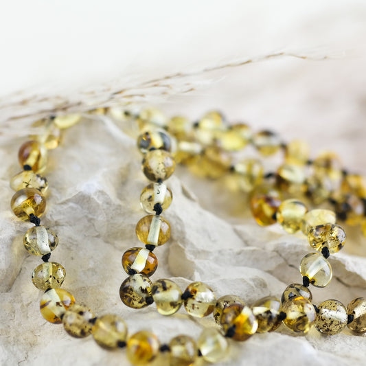 Handmade necklace from green amber beads