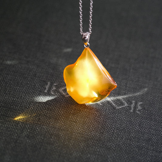 Natural amber caramel pendant