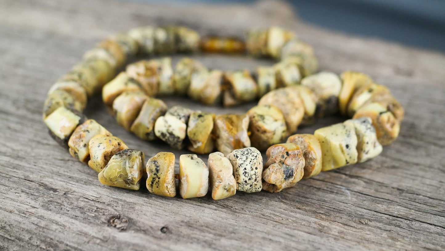 Sea sediment green tube shaped amber bead necklace