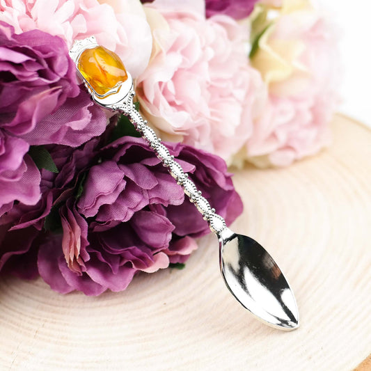 Tea spoon with natural Baltic amber stone