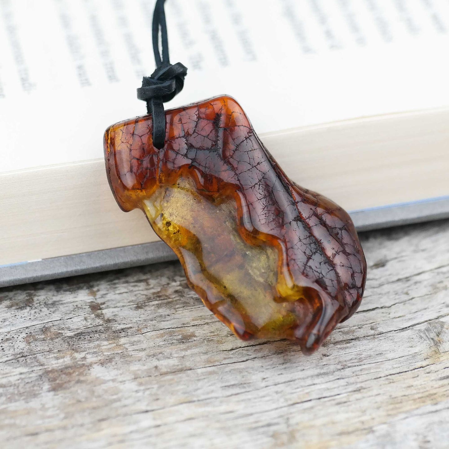 Women face natural amber pendant