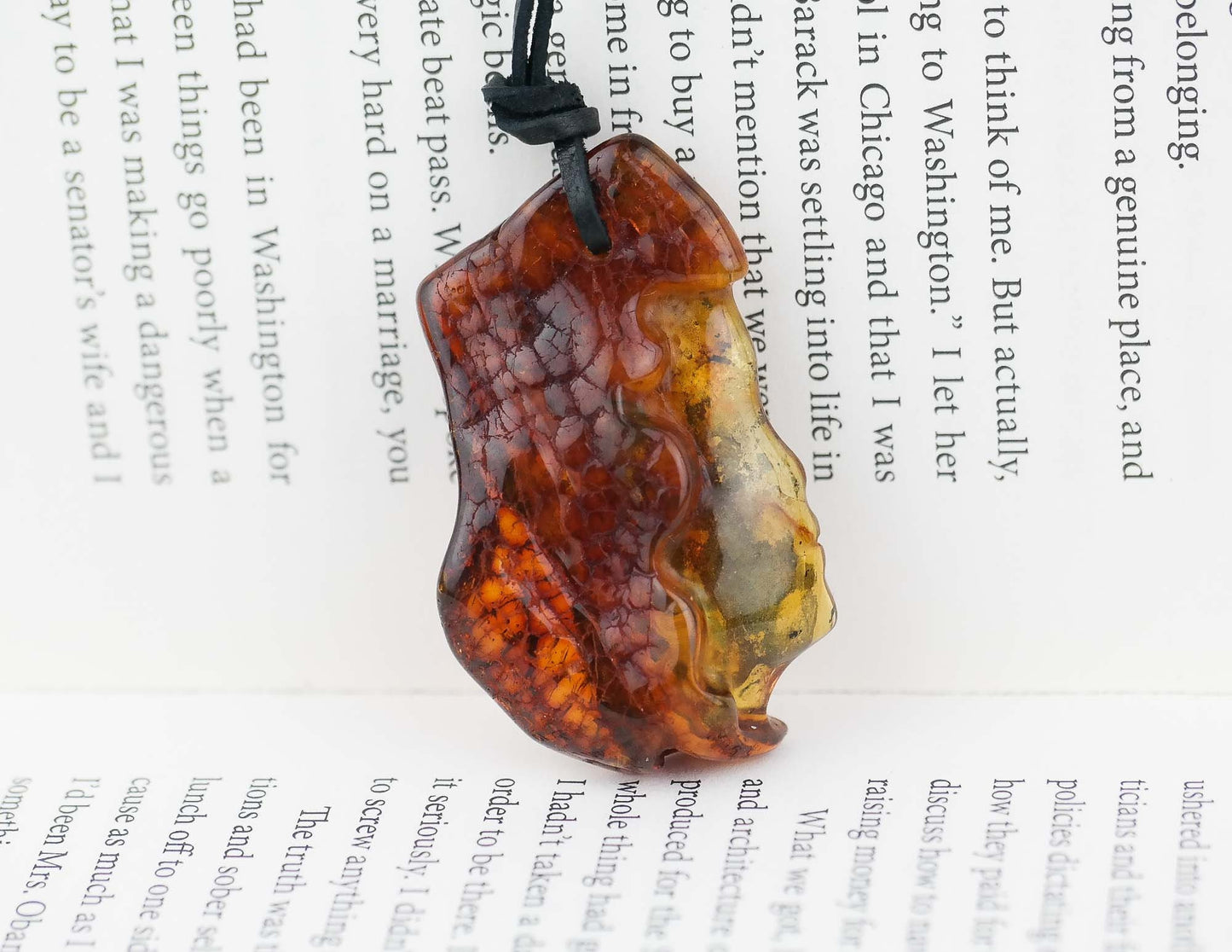 Women face natural amber pendant