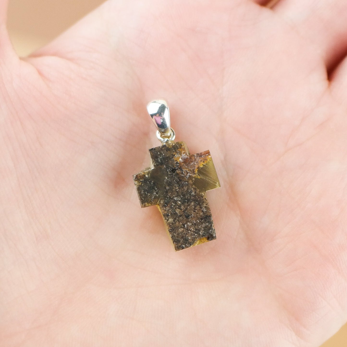 Green amber cross pendant