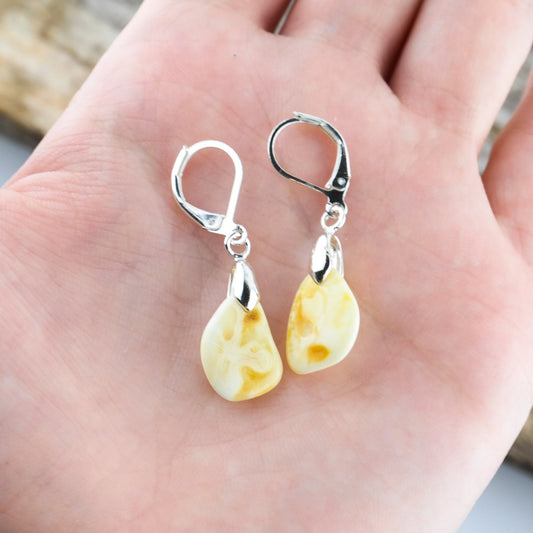 Earrings with natural amber beads