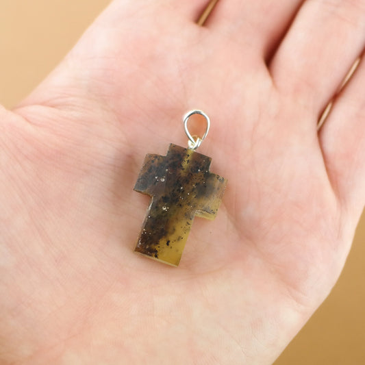 Raw amber cross pendant